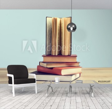 Picture of Libros sobre una mesa de madera y un fondo celeste Vista de frente Copy space